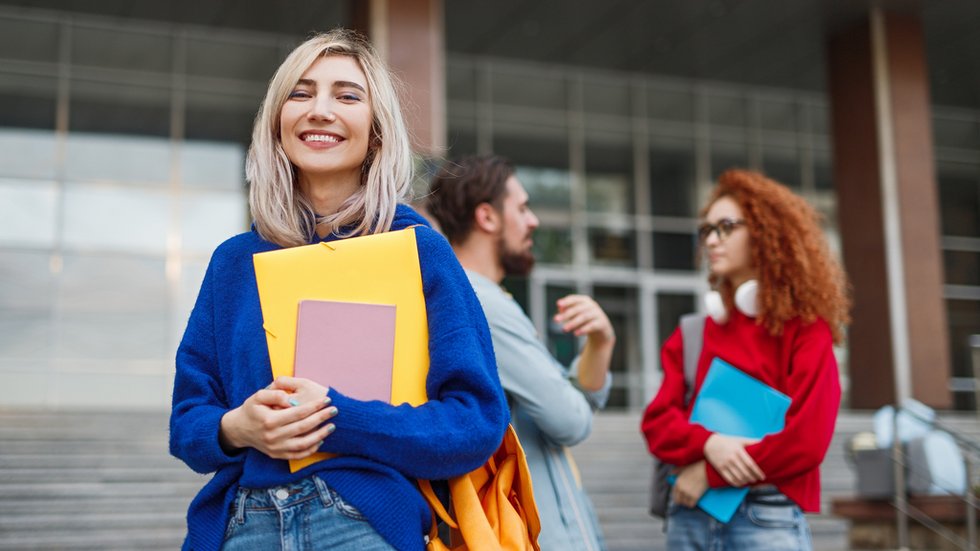 Cheerful young woman applying to university Element dekoracyjny
